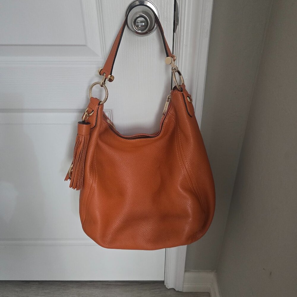 Michael Kors burnt orange hobo bag!